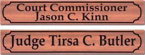 Judge and Commissioner signs